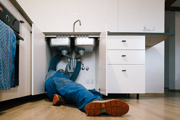 Professional Emergency Plumber technician working in Evergreen, AL